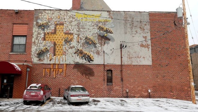 A ministry involving beehives is highlighted on the rear wall of Redeemer Lutheran Church.