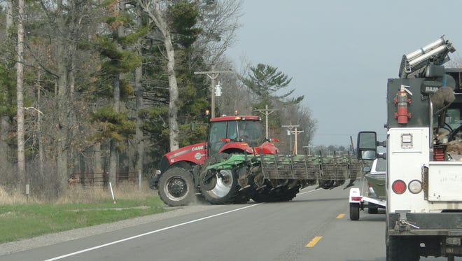 With the approach of spring motorists will encounter more farm implements on rural roads.  While some rules changed, common sense on the part of both must apply.