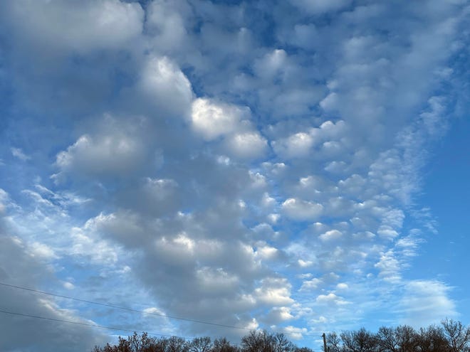 Puffy clouds in a sea of blue made Chris Hardie think of a patchwork quilt.