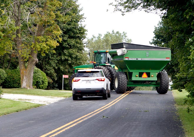 Drivers need to be aware of farm equipment making left turns.