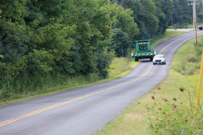 Passing farm equipment in a no-passing zone is illegal. Motorists should wait for a passing zone before attempting to go around slow moving vehicles.