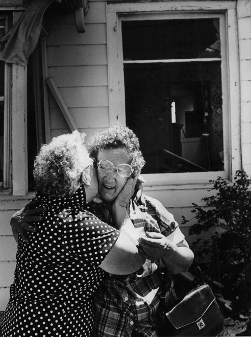 Residents of Barneveld comforted each other after a tornado killed nine people and destroyed many homes. Hazel Friedl, who was out of town when the tornado struck, hugged a neighbor when she returned.
