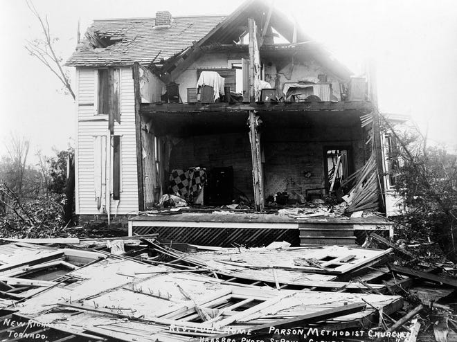 The recipe for tornadoes always includes heat, humidity and wind shear. This 1899 photo shows the home belonging to the parson of the New Richmond Methodist Church with a side sheared off.