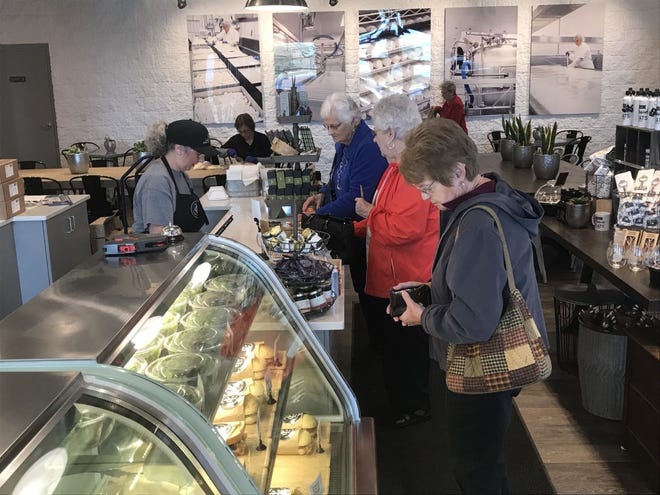 Customers order lunch inside the Cheese Shoppe and Cafe at LaClare Family Creamery.