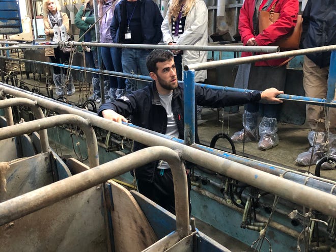 A young Irish dairy farmer shares information about his operation.