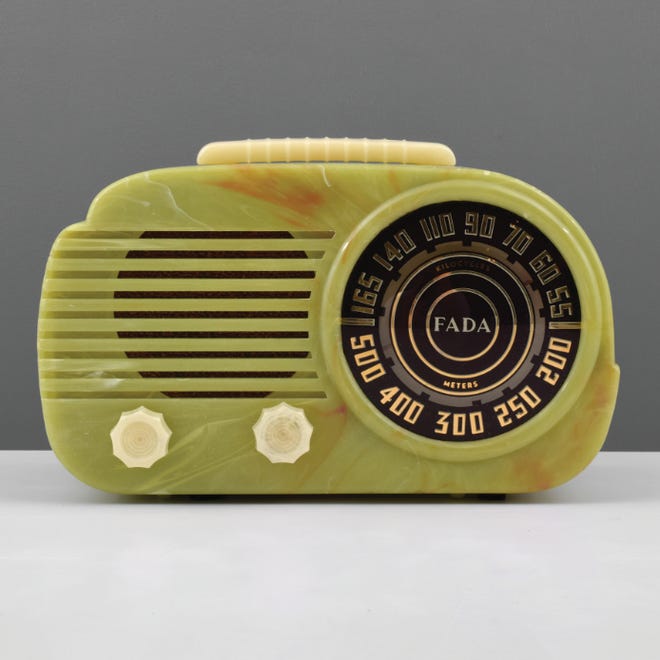 This plastic Fada radio was made about 1941. It is alabaster color and about 6 by 10 by 6 inches. Now faded to a light green, it sold for $1,000.