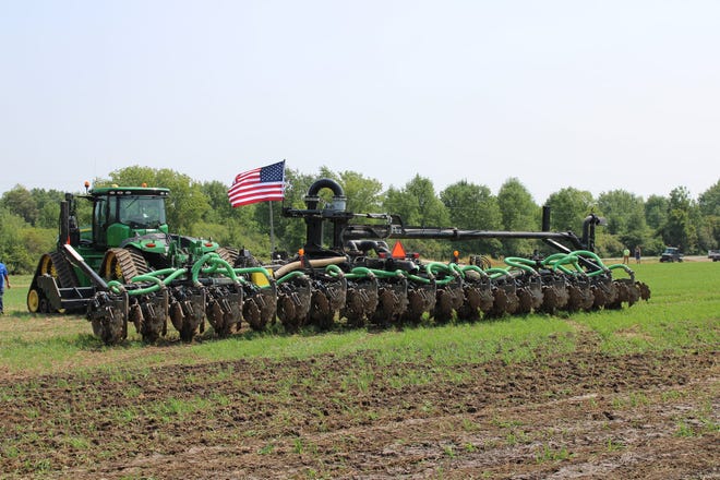 Farmers and non-farmers alike attended the Calumet County Ag Stewardship Alliance’s  first field day to see different methods of applying manure into and on the soil to give crops the most benefit from the organic nutrients.