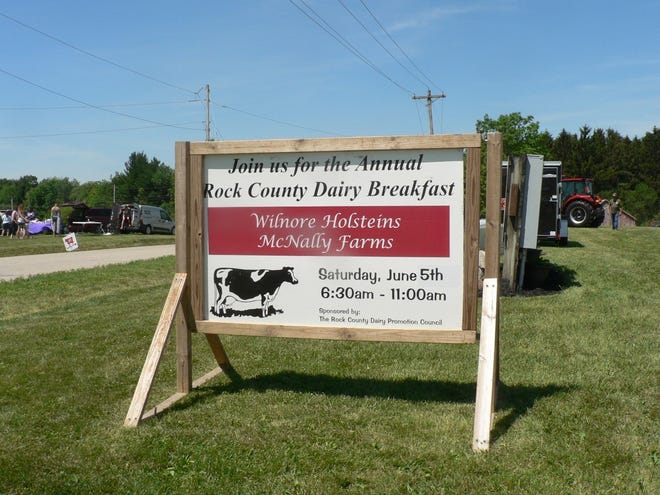The sign tells the story of the Rock County Dairy Breakfast and its host, Wilnore Holsteins/McNally Family Farms.
