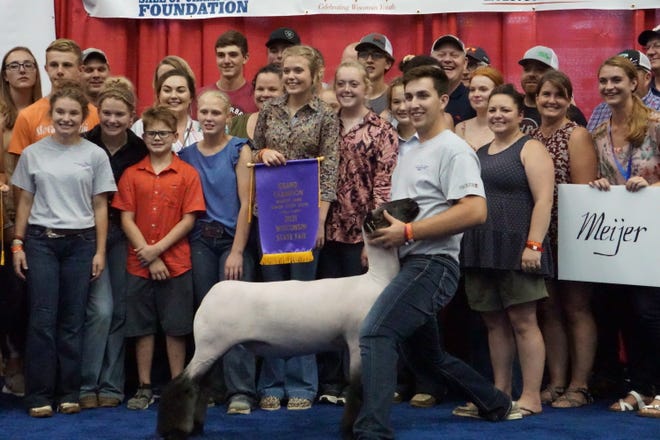Wesley Berget's Grand Champion Market Lamb sold for $12,000.