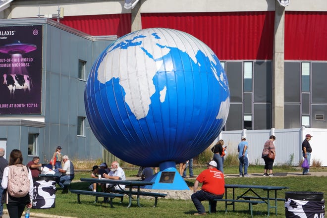 The iconic World Dairy Expo globe still spins in 2021.