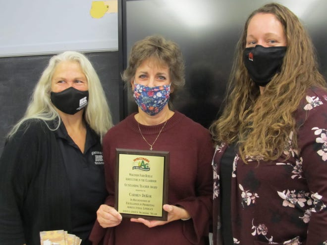 Janesville teacher Carmen DeKok, center, is this year’s recipient of Wisconsin Farm Bureau’s Ag in the Classroom program’s Outstanding Teacher Award. She is joined by Rock County Ag in the Classroom Committee members Sheila Everhart, left, and Stacy Skemp.