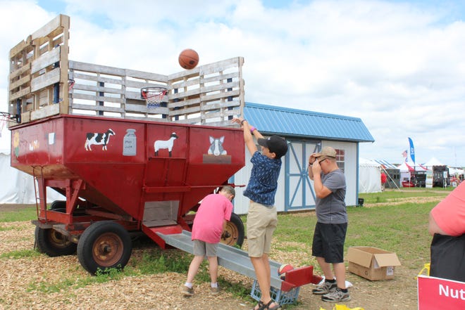 Kids have fun using a modified gravity box at Farm Technology Days in Clark County, July 12-14, 2022.